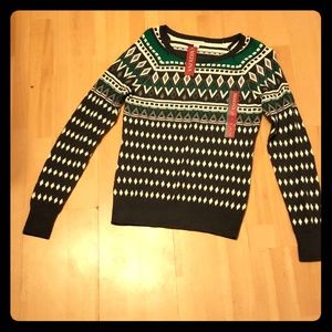 Grey, green, and white sweater